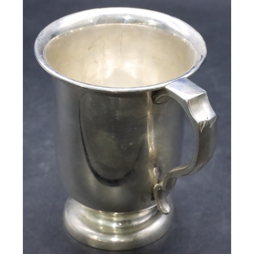 382 - A Birmingham plain silver trumpet shaped tankard with scroll handle on sweeping foot, 13cm high, 8.3... 