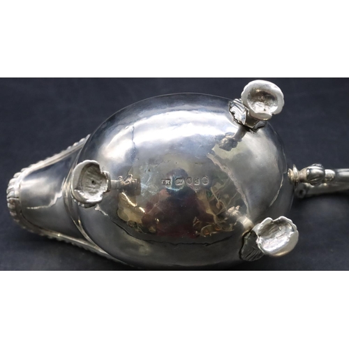 387 - An 18th Century George III silver sauce boat with gadroon rim, scroll handle on shell shaped feet, L... 