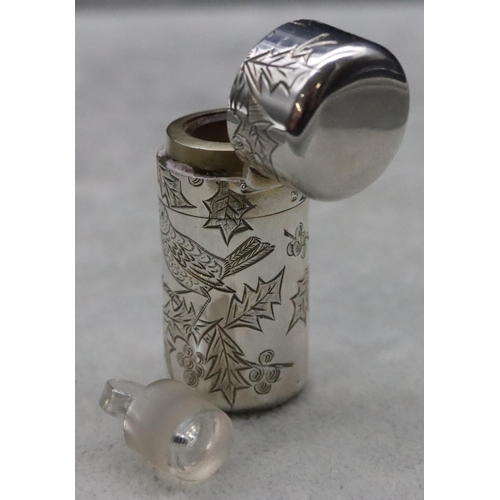 390 - A Victorian silver Sampson Mordan cylindrical scent bottle with hinged lid enclosing inner stopper, ... 