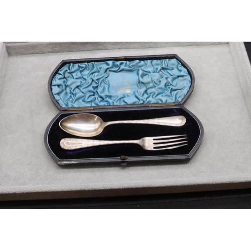 396 - A Victorian silver christening set comprising of fork and spoon in fitted leather case, maker Elking... 