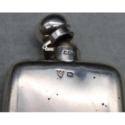 399 - A George V Sheffield silver plain concave shaped hip flask, engraved with initials, hinged top, 11.3... 