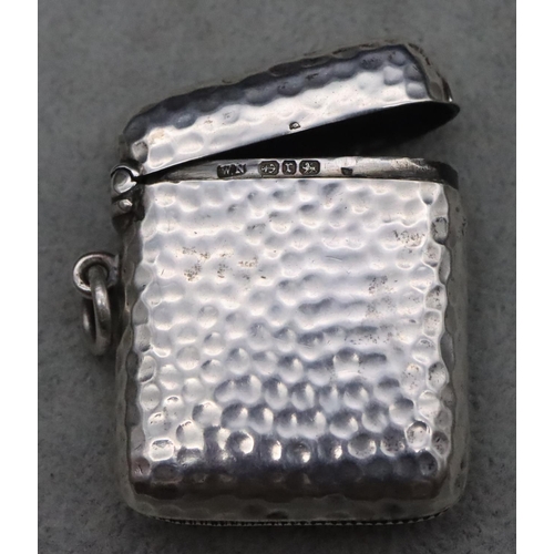 410 - A Victorian hammered silver vesta case with hinged lid, maker William Neale, 0.8oz