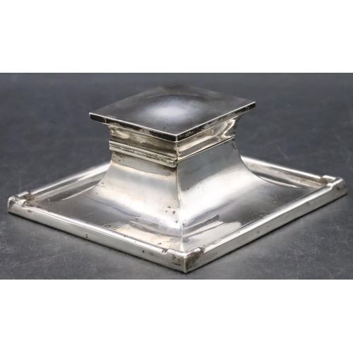 414 - A Birmingham silver square inkwell with hinged lid enclosing glass inkwell, on weighted splayed base... 