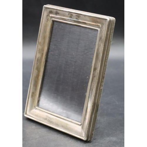 415 - A Birmingham silver plain rectangular shaped photograph frame, 16cm high