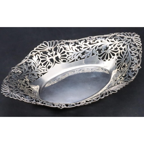 431 - A London silver basket with pierced scallop shaped gallery with allover floral, leaf and scroll deco... 