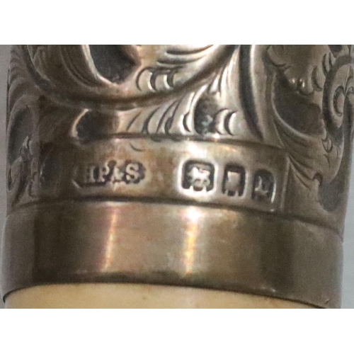 435 - A London silver mounted knob walking cane with embossed leaf and scroll decoration, 92cm high