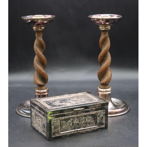 440 - A pair of silver plated and oak barley twist candlesticks on sweeping bases, 22cm high and a silver ... 