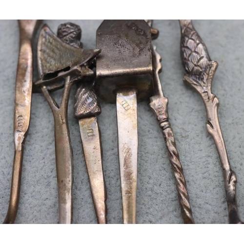 453 - A set of 6 Continental 800 silver coloured metal coffee spoons with various figure, bird and boat fi... 