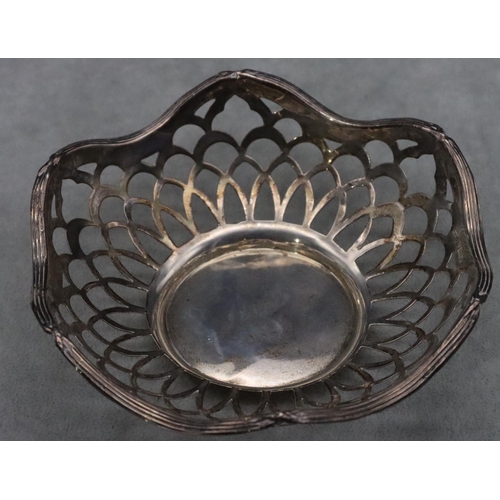 458 - A Birmingham silver round scallop shaped sweet meat dish with pierced gallery, 15cm diameter, 2.2oz