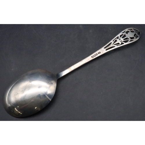 463 - A Sheffield silver serving spoon with pierced finial, maker's mark GH, in fitted red leather case, 1... 