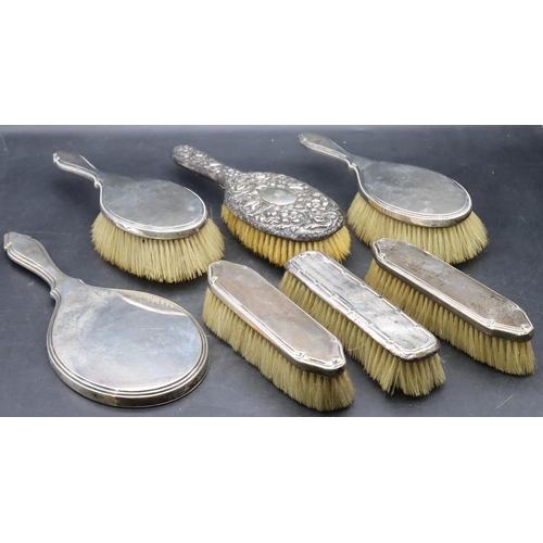 464 - A 5-piece London silver plain dressing table set comprising hand mirror and 4 brushes, maker Mappin ... 