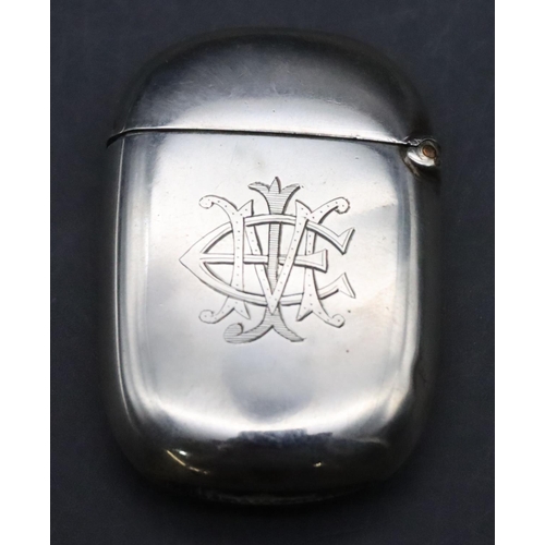 469 - A Birmingham plain silver vesta case with engraved monogram and hinged lid