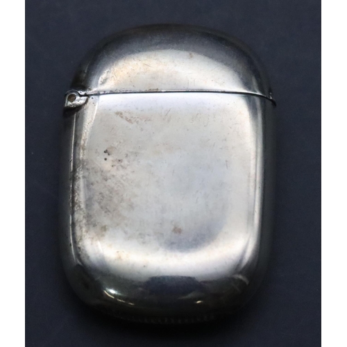 469 - A Birmingham plain silver vesta case with engraved monogram and hinged lid