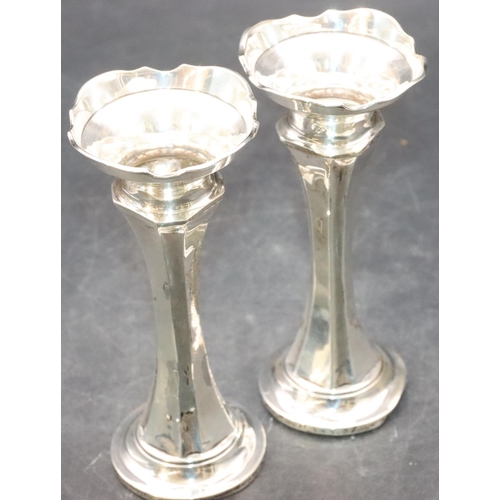 471 - A pair of Chester silver trumpet shaped spill vases with crinkle rims and allover chamfer decoration... 