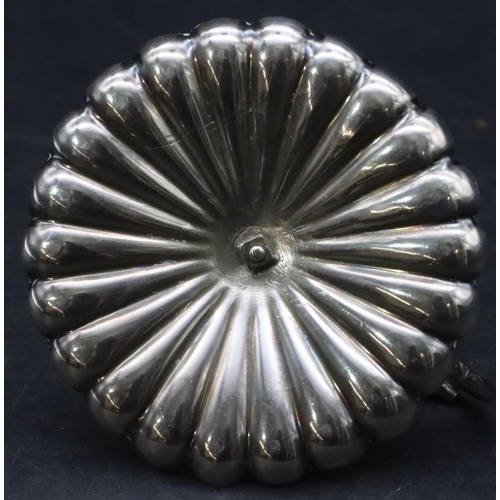 472 - A Victorian Birmingham silver round scallop shaped chamber candlestick with branch and petal decorat... 