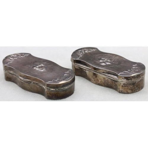 485 - 2 near matching silver rectangular shaped trinket boxes with embossed figure, shell and scroll decor... 