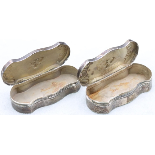 485 - 2 near matching silver rectangular shaped trinket boxes with embossed figure, shell and scroll decor... 