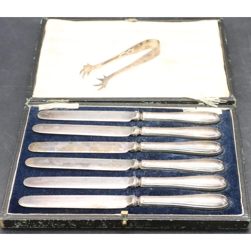 488 - A pair of Sheffield silver sugar tongs with claw ends and a set of 6 Sheffield silver handled butter... 