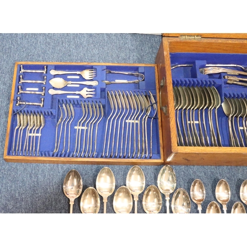 492 - A silver plated King's pattern 12-place setting flatware service and an oak canteen case with furthe... 