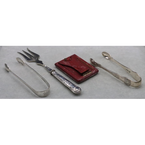 494 - A pair of Georgian plain silver sugar tongs, another pair of Sheffield silver sugar tongs, 2.2oz, a ... 