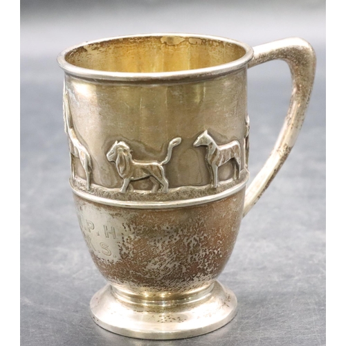 499 - A George VI silver child's christening mug with raised procession of 2 figures, elephant, giraffe, l... 