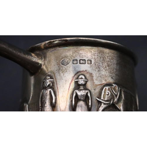 499 - A George VI silver child's christening mug with raised procession of 2 figures, elephant, giraffe, l... 