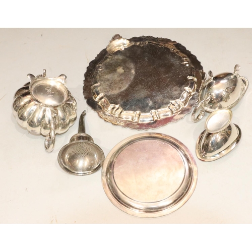 501 - A Sheffield silver wine funnel, a silver plated salver, a smaller silver plated card tray, a silver ... 