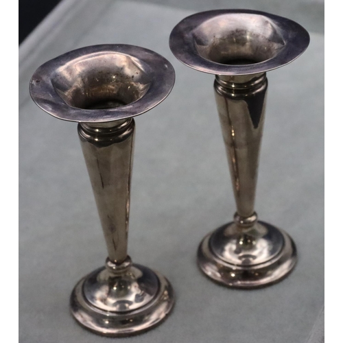 503 - A pair of Chester silver round trumpet shaped spill vases on round weighted bases, 13cm high (rims d... 