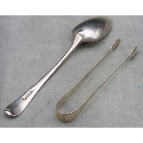 506 - A pair of Georgian plain silver sugar tongs and a Georgian silver tablespoon, 2.8oz