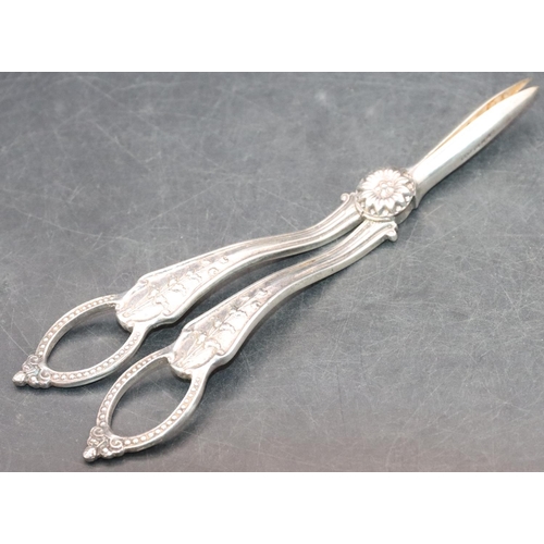 510 - A pair of London silver grape scissors with raised floral, leaf and ball decoration, 3oz