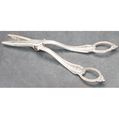 510 - A pair of London silver grape scissors with raised floral, leaf and ball decoration, 3oz