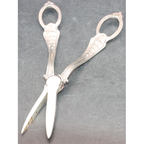 510 - A pair of London silver grape scissors with raised floral, leaf and ball decoration, 3oz