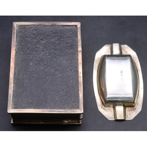 511 - A silver rectangular shaped cigarette box with engine turned hinged lid enclosing cedar lined interi... 