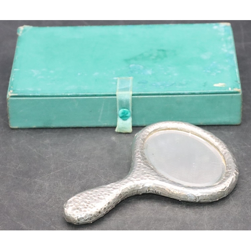 901 - A miniature hammered pewter Arts & Crafts style hand mirror, 14cm long (boxed)