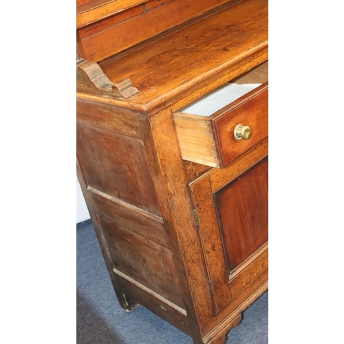 954 - A George III oak and mahogany breakfront Welsh dresser with shelfed back, 4 graduated centre drawers... 