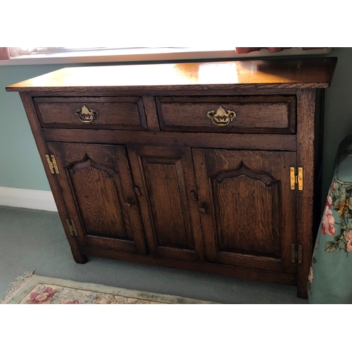 9008 - A Titchmarsh and Goodwin small oak cabinet with 2 drawers, 2 panel doors below enclosing interior sh... 