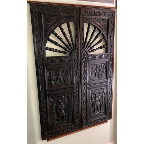 9013 - An antique carved wood hinged panel, 88.5cm wide, 128cm high, 2.7cm deep. (section of wood missing t... 