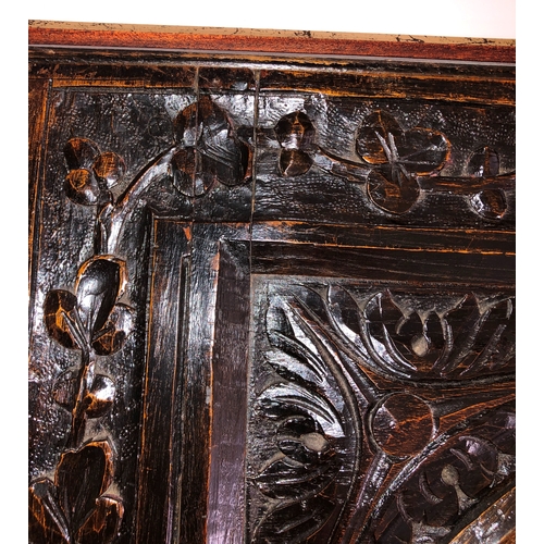 9013 - An antique carved wood hinged panel, 88.5cm wide, 128cm high, 2.7cm deep. (section of wood missing t... 