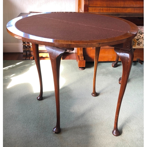 9017 - A burr walnut card table with semi-circular hinged top opening out circular top with brown felt, 4 l... 