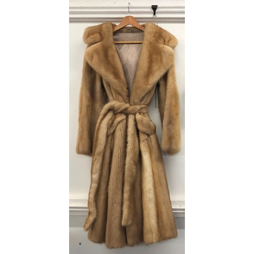 9021 - A Saga fully lined full length light brown mink coat with 2 pockets and matching belt, 116cm long si... 