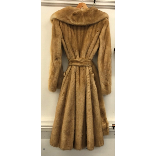 9021 - A Saga fully lined full length light brown mink coat with 2 pockets and matching belt, 116cm long si... 