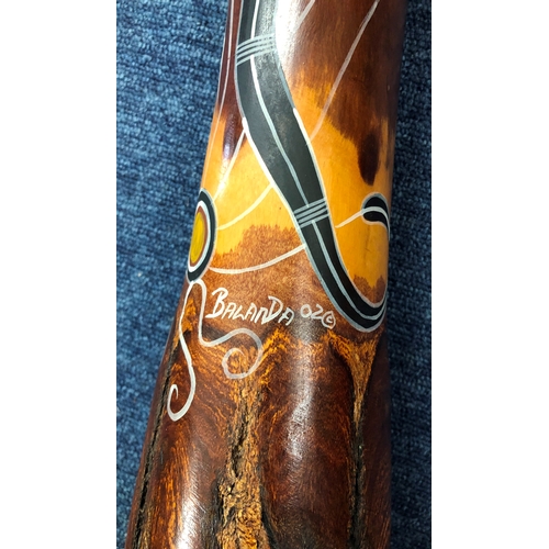 9027 - An Australian hand painted didgeridoo, signed, Balanda 02, 141cm long.