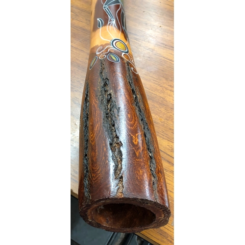 9027 - An Australian hand painted didgeridoo, signed, Balanda 02, 141cm long.