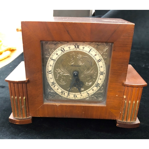 9028 - A small walnut timepiece labelled Rotherhams A08044, 14.2cm high, 19cm wide