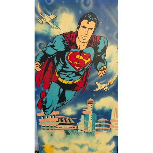 9030 - A hand painted superman panel, 121 x 61cm and another similar hand painted Superman panel 49 x 61cm.... 