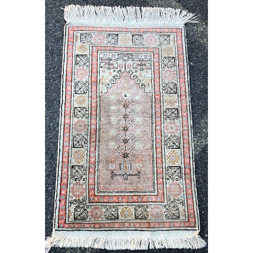 9032 - A small Persian prayer rug on cream ground with centre medallion, 95 x 60cm