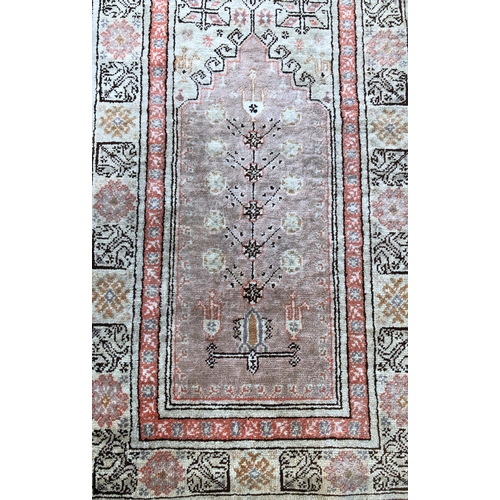 9032 - A small Persian prayer rug on cream ground with centre medallion, 95 x 60cm