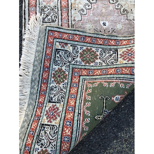 9032 - A small Persian prayer rug on cream ground with centre medallion, 95 x 60cm