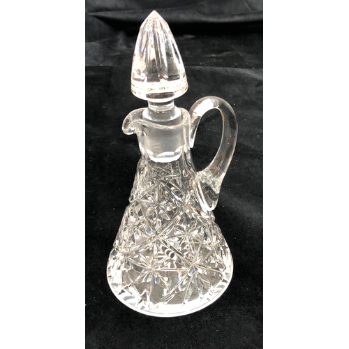 9056 - A set of 6 cut crystal and etched glasses, a cut crystal jug with stopper (chipped to tip), 20cm hig... 