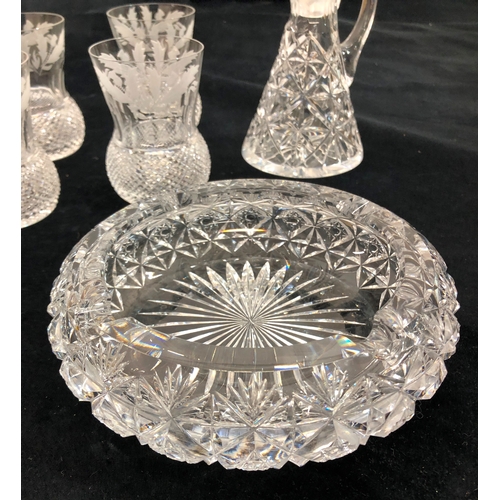 9056 - A set of 6 cut crystal and etched glasses, a cut crystal jug with stopper (chipped to tip), 20cm hig... 